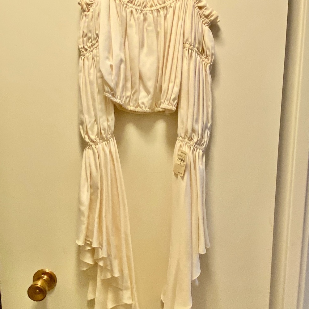Norma Kamali cream colored shirt